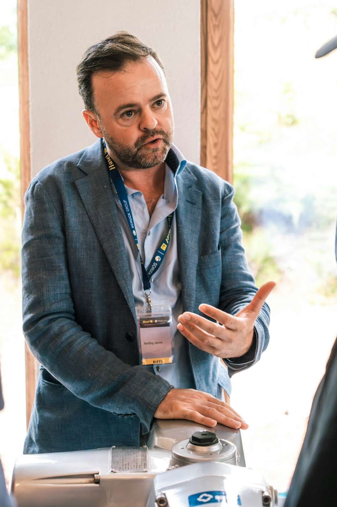 man speaking confidently at meeting