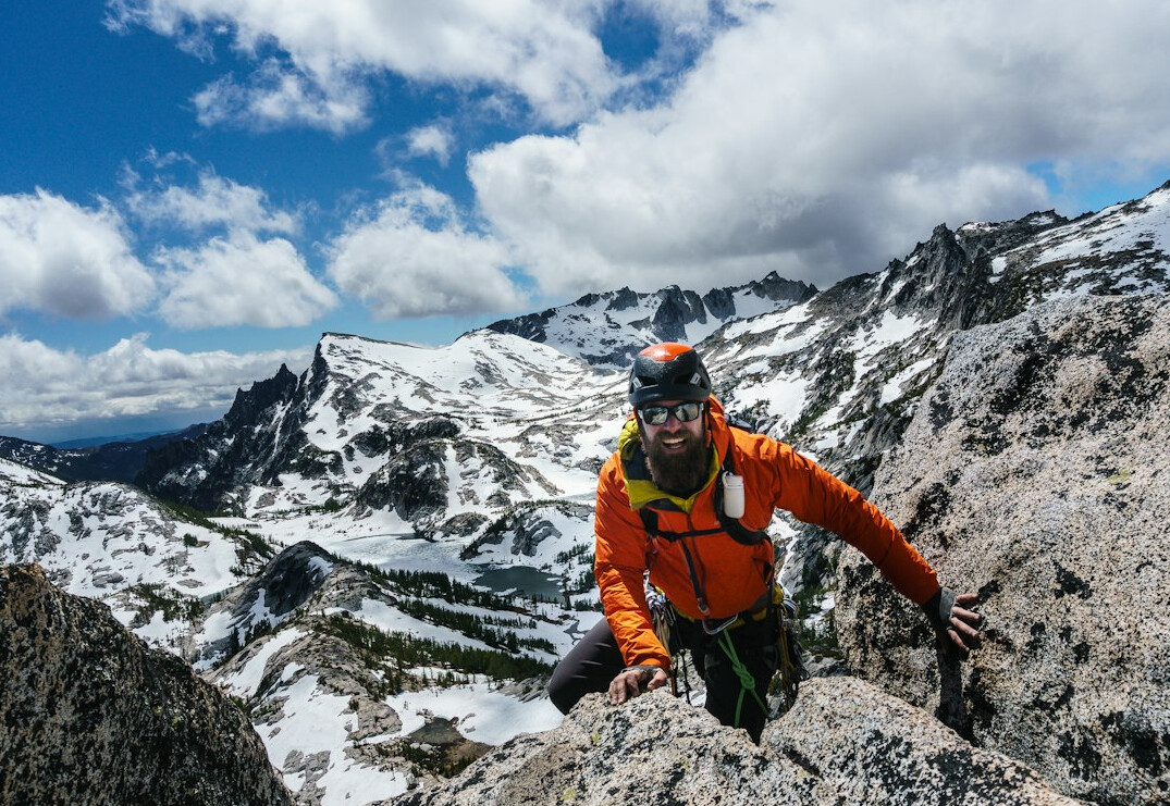 woman climbing mountain